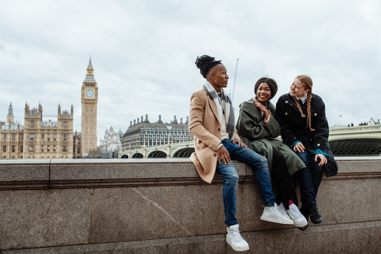 People walking in London, representing expats preparing to move to the UK for tax planning